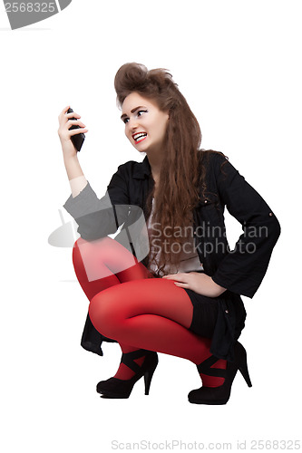 Image of Teenage girl in black and red clothes