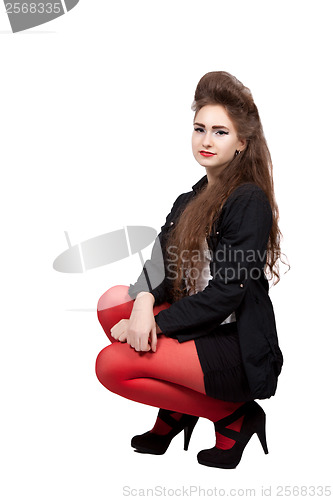 Image of Teenage girl in black and red clothes