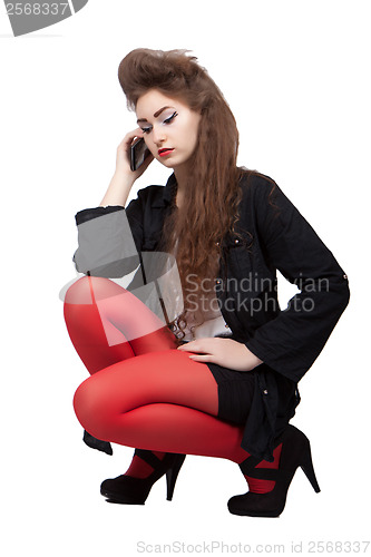 Image of Teenage girl in black and red clothes