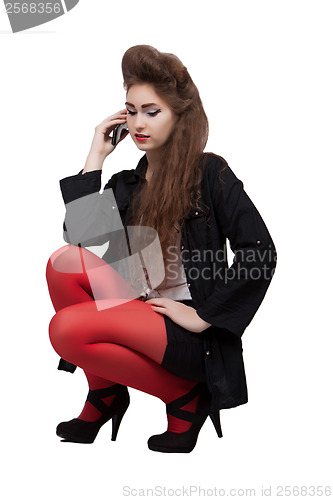 Image of Teenage girl in black and red clothes