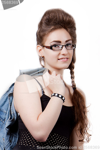Image of Teenage girl in a blue denim dress