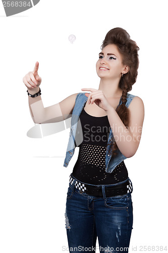 Image of Teenage girl in a blue denim dress