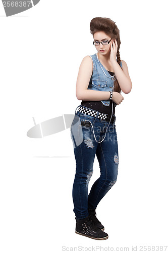 Image of Teenage girl in a blue denim dress