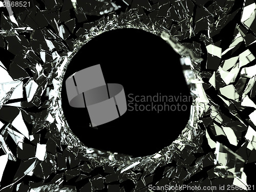 Image of Bullet hole and pieces of shattered glass