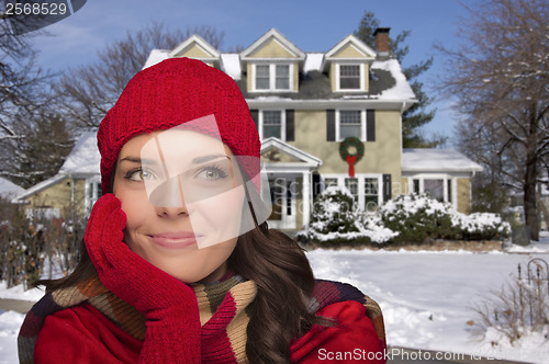 Image of Smiling Mixed Race Woman in Winter Clothing Outside in Snow