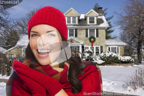 Image of Smiling Mixed Race Woman in Winter Clothing Outside in Snow