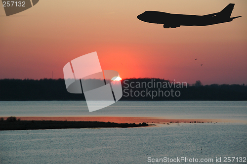 Image of Sunset and plane