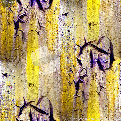 Image of yellow purple seamless abstract texture of old iron with cracks 