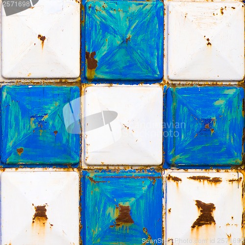 Image of texture rusty white and blue squares