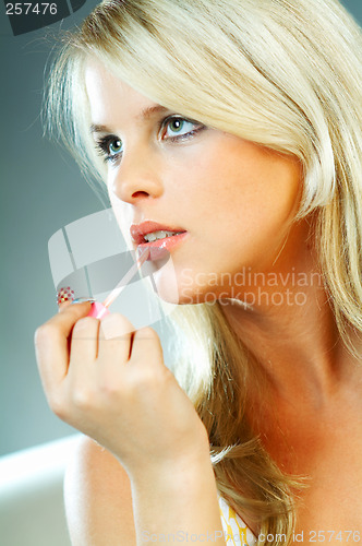 Image of Girl doing makeup