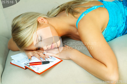 Image of Blonde woman with datebook