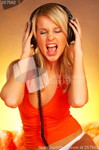 Image of Sexy Girl with headphones close up