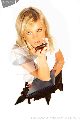Image of women holding cell phone and folder