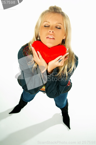 Image of girl holding a red velvet heart