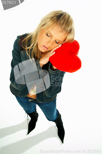 Image of girl holding a red velvet heart