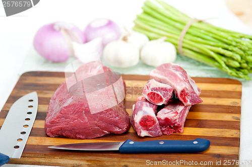 Image of raw beef and pork ribs