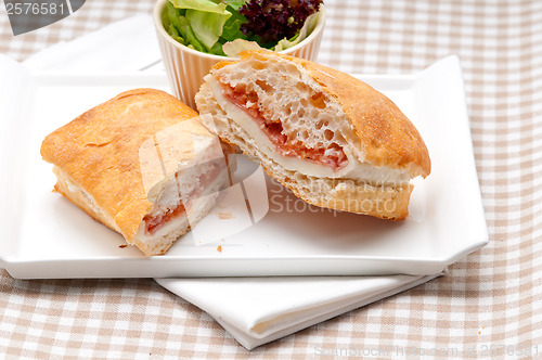 Image of ciabatta panini sandwich with parma ham and tomato