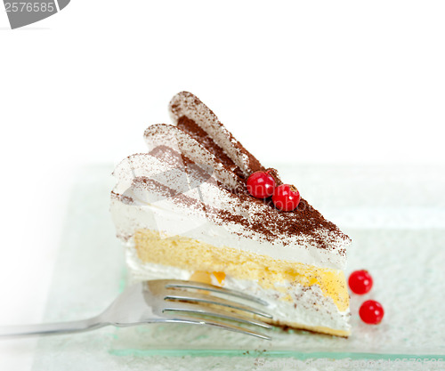 Image of whipped cream and ribes dessert cake slice