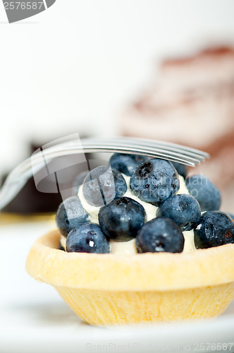 Image of blueberry cream cupcake