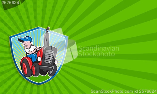 Image of Farmer Driving Vintage Tractor Cartoon