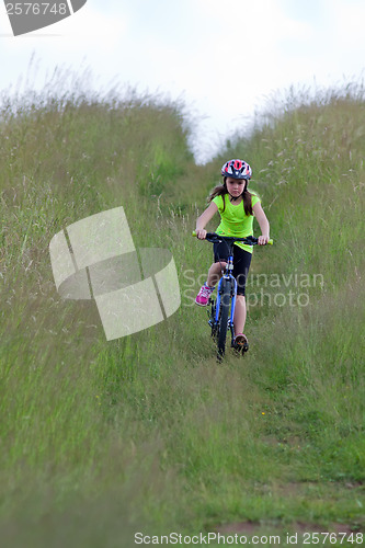 Image of Teens girl on bike