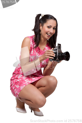 Image of Retro girl in a pink dress