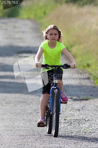 Image of Teens girl on bike