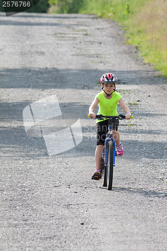 Image of Teens girl on bike