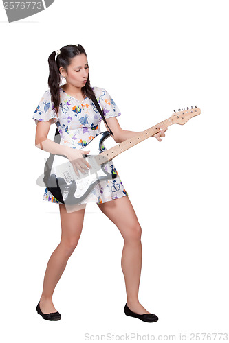 Image of A girl with pigtails in colorful retro dress