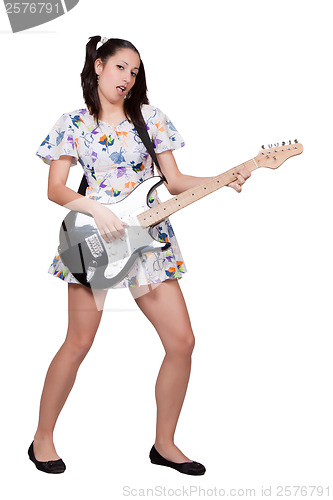 Image of A girl with pigtails in colorful retro dress