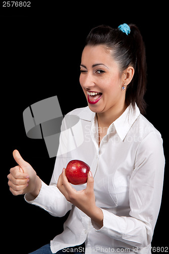 Image of woman eat red apple