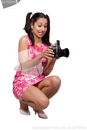 Image of Retro girl in a pink dress