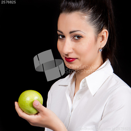 Image of woman eat green apple