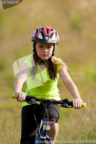 Image of Teens girl on bike