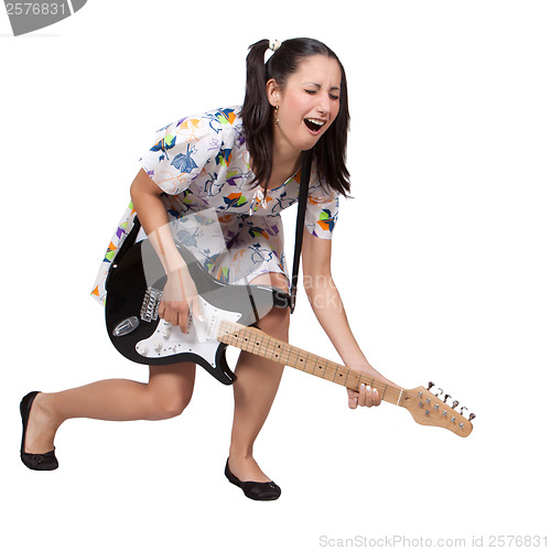 Image of A girl with pigtails in colorful retro dress