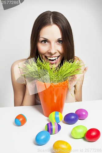 Image of Girl and painted eggs