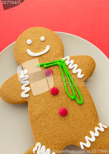 Image of Gingerbread cookies with red background