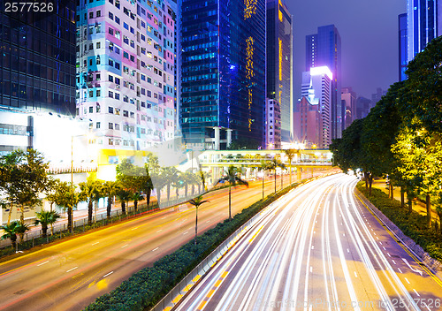 Image of Busy road in city at night