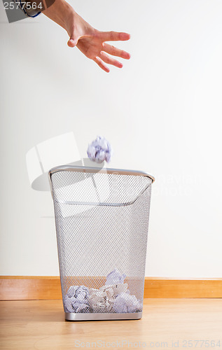 Image of Throwing of paper ball by hand