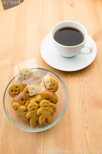 Image of Gingerbread man with coffee