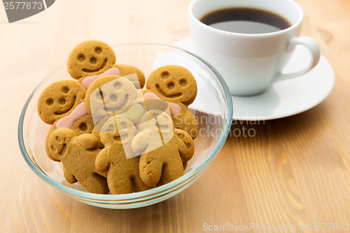 Image of Gingerbread man with coffee