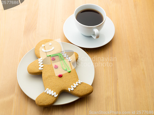 Image of Gingerbread cookie and coffee