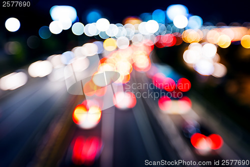 Image of Blurred unfocused highway view at night