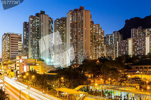 Image of Kowloon with lion rock at night