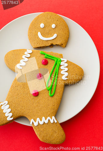 Image of Cracked Gingerbread cookie with pink background