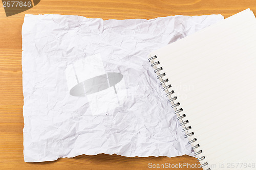 Image of White crumple paper and notepad
