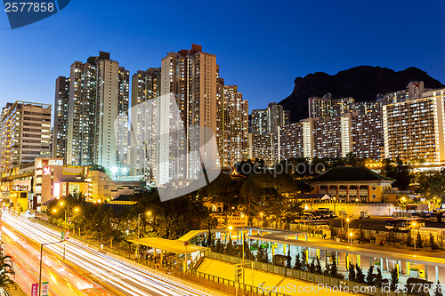Image of Kowloon with lion rock at night