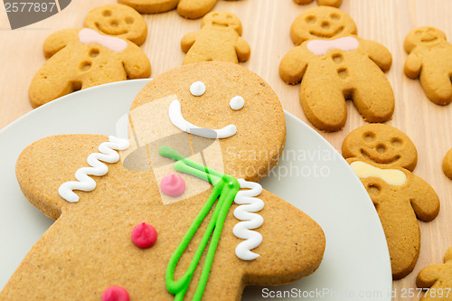 Image of Traditional gingerbread cookies on wooden background