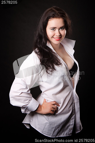 Image of Woman posing in a white men's shirt