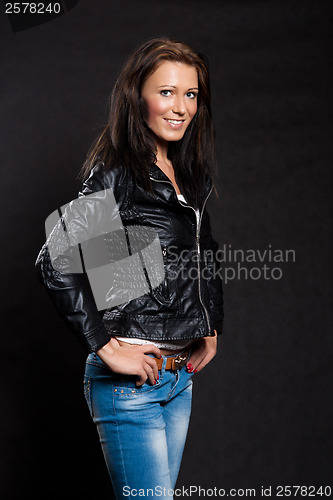 Image of Long-haired woman in a leather jacket